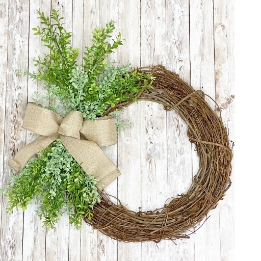 wreath with greenery and bow